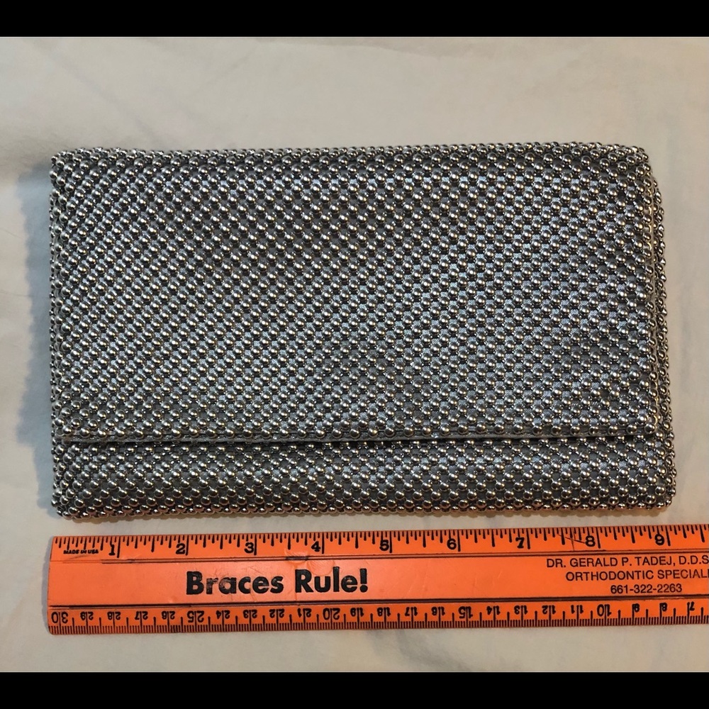 Silver beaded clutch with chain. Can use with or without chain. Brand new I•N•C.